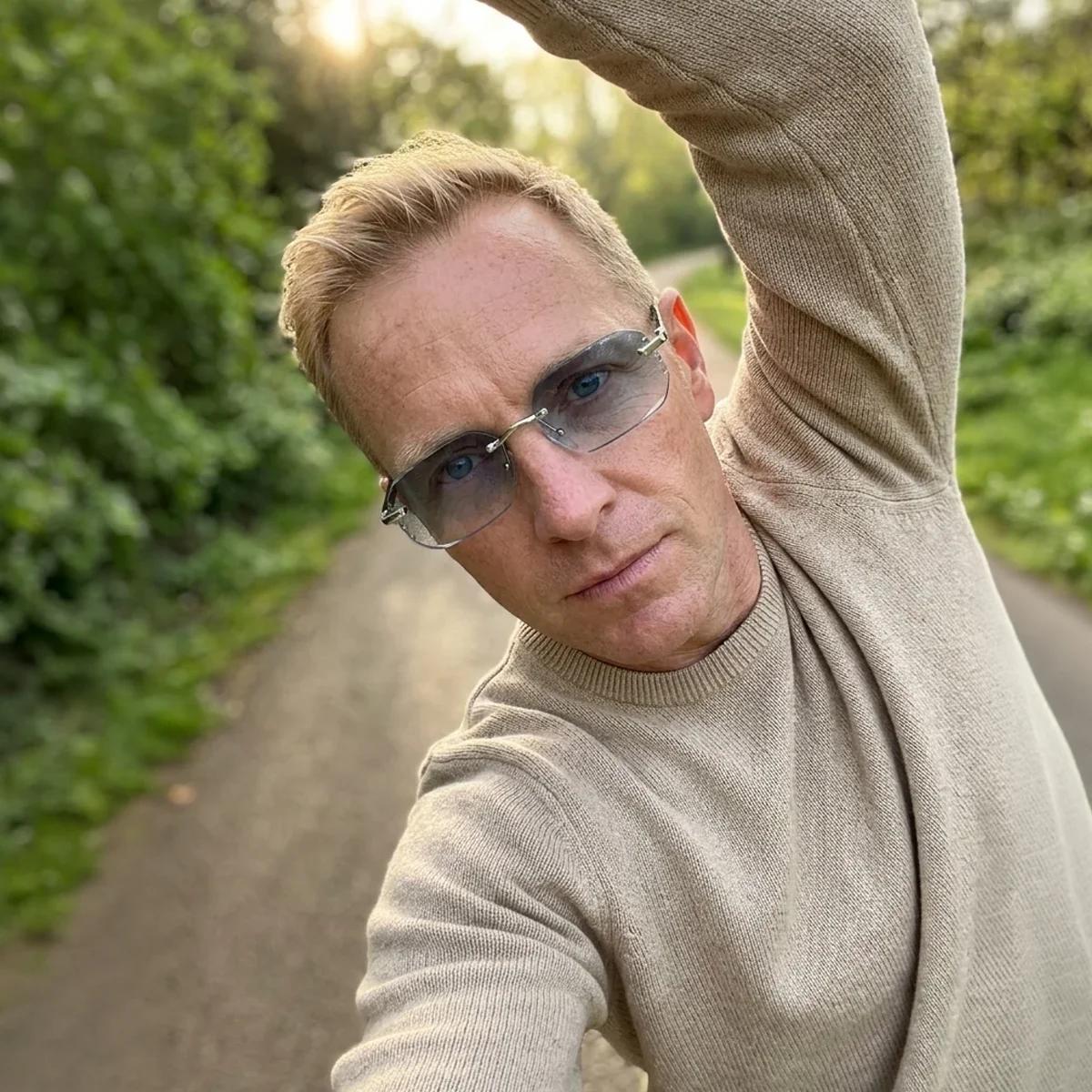 James P. wearing BlueLume glasses